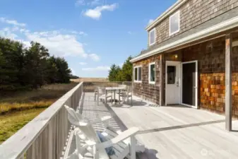 The beautiful Ipe hardwood deck welcomes you to the front entry and wraps around the home for durable indoor-outdoor living.