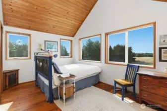 Wake up to views of the Pacific from this peaceful loft bedroom retreat.