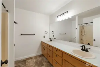 Primary bedroom 4 piece bath with new oil rubbed bronze fixtures and new lighting