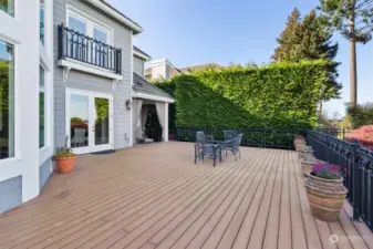 You can find lots of spots for Summertime flowers on this expansive deck.