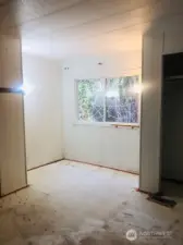 Primary Bedroom - great space for desk or reading area by the window. Carpets have been removed.