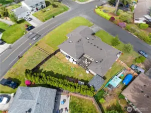 Spacious 1/3 acre fully fenced with more room on side of the house and entry thru side gate. RV parking
