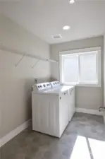 Spacious laundry room with natural light