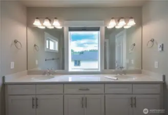 Primary bathroom with double vanity sinks