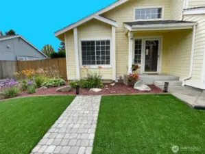 Beautiful flower gardens all through the front yard.