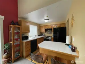 Snack bar off of kitchen.
