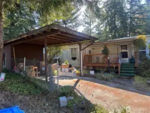 Large 2 bedroom home on large private fenced corner lot.