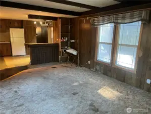 Living room looking into the kitchen.