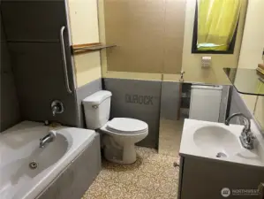 Another view of bathroom with soaking tub.