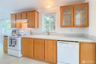 Corian Countertops-Window to Fenced Backyard