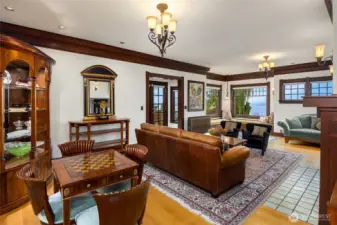 The home's woodwork is beyond unbelievable! Trimmed out in the highest standards, the 12' ceiling cornices have much detailing. The original large windows are spectacular and protected with storm windows for efficient insulation.
