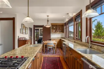 Amongst the favorite of rooms, the kitchen has full length windows to capture all the morning sunrises, and bay views. Gorgeous at evening too with the city lights.