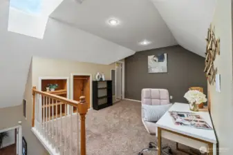 The open loft adds flexible living space and could easily be enclosed as a private fourth bedroom or guest suite—ideal for extended living, multigenerational use, or a quiet work-from-home retreat.