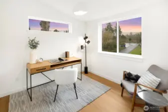 One of the upper bedrooms is staged as an office.