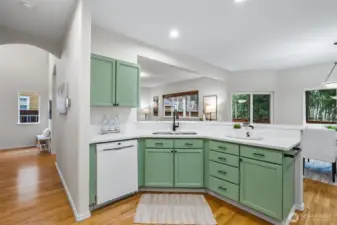 kitchen with view into living and dining room