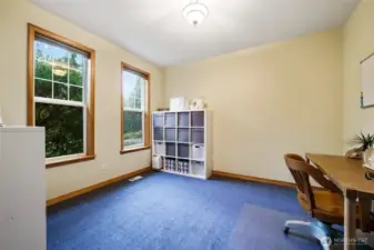 Main-floor office with bright, natural light is a great work from home option.