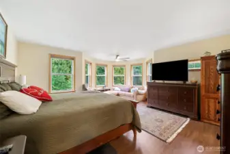 Luxurious primary suite with sitting area.