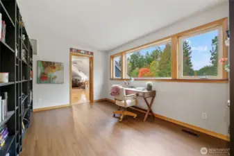 Upper-level sitting/reading area/playroom/office space.