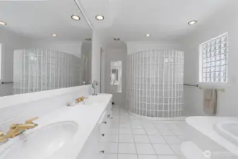 Primary bathroom with a large walk in shower, soaking tub, double sinks and a view!