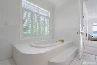 Soaking tub in the primary bathroom.