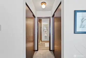 Double closets conveniently located between the bedroom and bathroom.