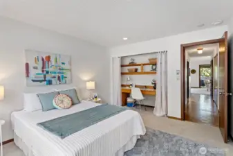 A clever use of space with a built-in office nook and shelving for those who work from home.