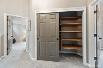 Hall closet with lots of storage