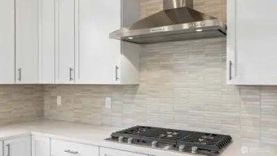 Gas cooktop! Upgraded white cabinetry.