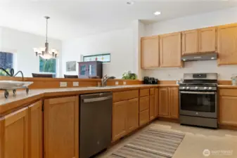 Large kitchen with a suite of new appliances