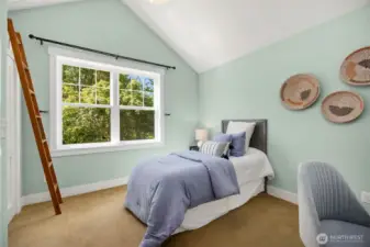 Second upstairs bedroom with loft space above the cloaet