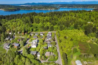 View from above looking South toward Rich Passage with the Olympic Mountains in the distance