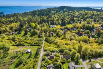 View from above looking East toward Puget Sound with Seattle in the distance