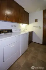 Utility room-- washer & dryer stays.