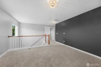 Second floor loft designed to be easily reconfigured as a fourth room.