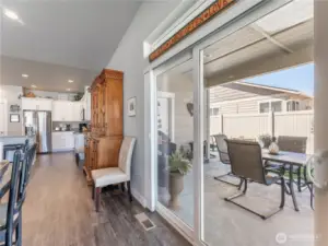 Slider access to covered patio allows seamless indoor/outdoor entertaining