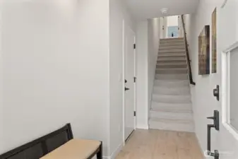 Wide entry with easy access to 2 car garage.