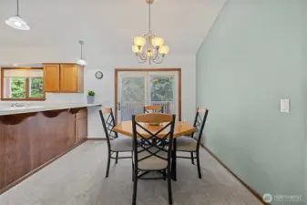 Dining area with access to the large rear deck.