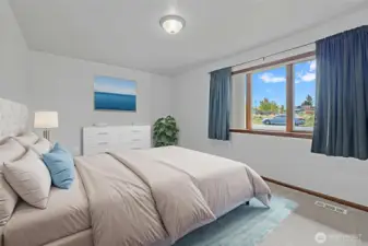 Virtually staged  bedroom.
