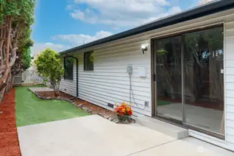 Back patio, fully fenced for all your 4 legged friends.  Trees light up every night (lighting is solar powered), makes this a fabulous spot to just chill and relax after a long day