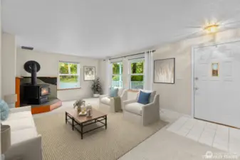 Virtually staged living room shows one option for furniture placement