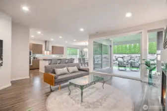 Great room has a wall sliding glass door to covered deck