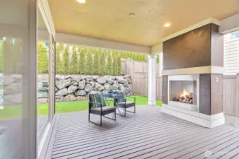 Large covered deck has cozy gas fireplace and plumbed for gas BBQ's