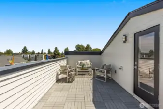 Private roof deck with gas hook-up water spigot and perimeter lighting extends your living outdoors.