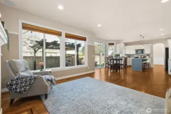 The kitchen’s seamless flow into the family room makes entertaining effortless. Guests can mingle while meals are prepared, keeping everyone part of the moment. It’s a layout designed for connection. A large pantry provides exceptional storage, keeping the kitchen organized and efficient. Everything has its place, making meal prep a breeze. It’s a feature every home cook will appreciate.