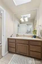 The upstairs Full guest bath offers a separate W/C for flexibility.