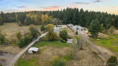 Farm friends in the front of the home with your own private pond?