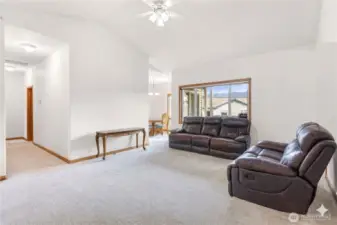 Spacious Living Room with Vaulted Ceilings and Natural Light in sunny Sumas - Virtually Decluttered