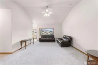 Living Room with Sliding Door Access and Indoor-Outdoor Connection - Virtually Decluttered