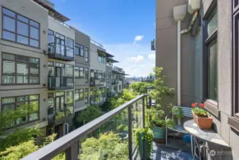 The private Deck off the Primary Bedroom looks due South and enjoys Downtown Seattle Views.