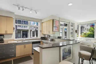 Kitchen has Stainless Appliance set plus Eating Bar.